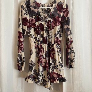 Boutique Floral Long-Sleeve Playsuit with Lace-Up Front and Ruffle Shorts